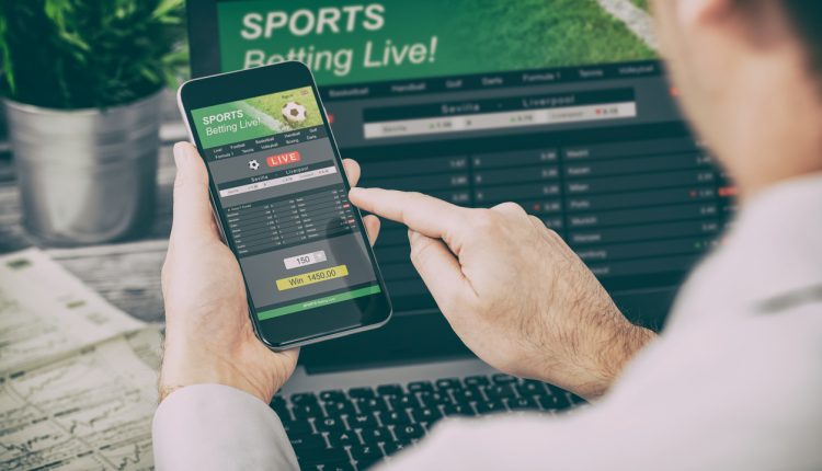 betting bet sport phone gamble laptop concept